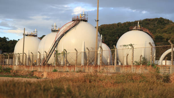 istock Chemical or NGV, LGP Storage tanks in a field under a blue sky 2192140422