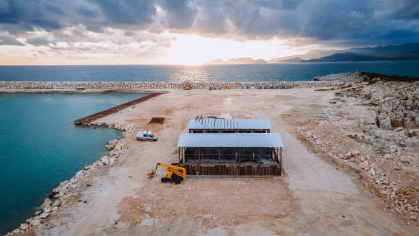 istock Industrial Warehouse at Coastal Sunset 2192141160