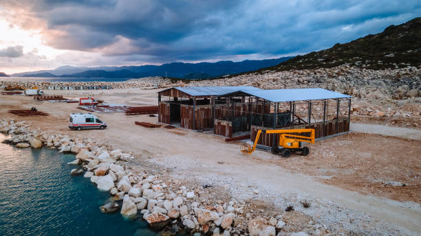 istock Coastal Construction Site with Industrial Warehouse 2192141260