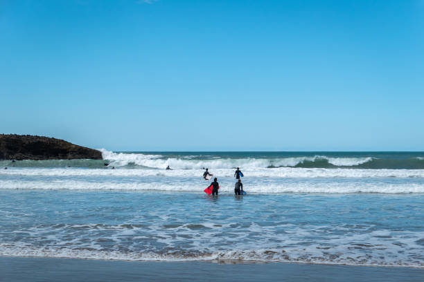 istock Surfer on the waves at the beach 2192142089