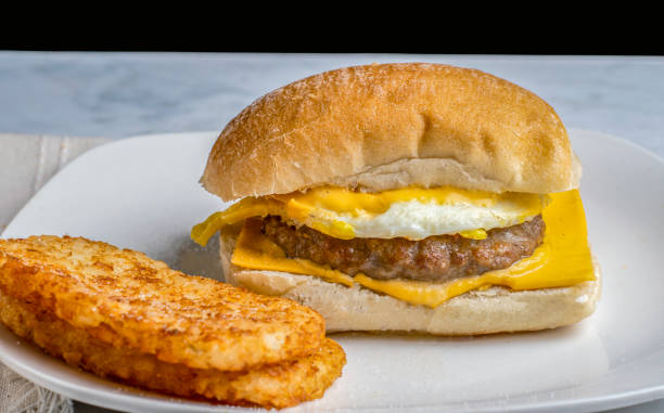 istock sausage patty fried egg , and cheese breakfast sandwich 2192145789