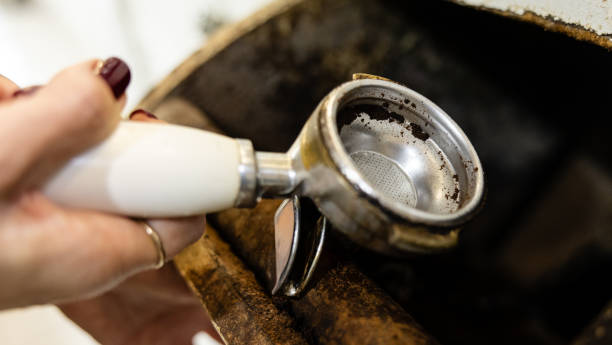 istock Used coffee grounds in portafilter after brewing. 2192146932