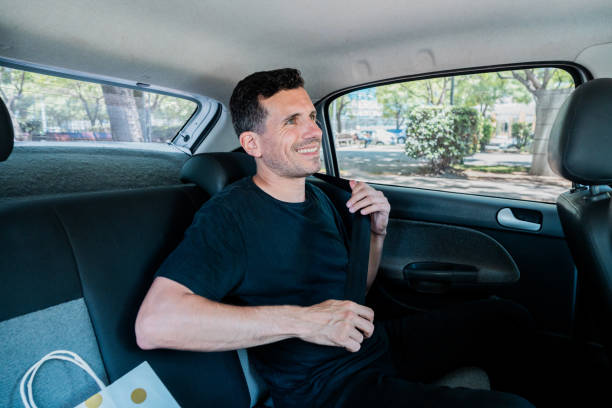 istock Mature man putting seat belt on car 2192148009