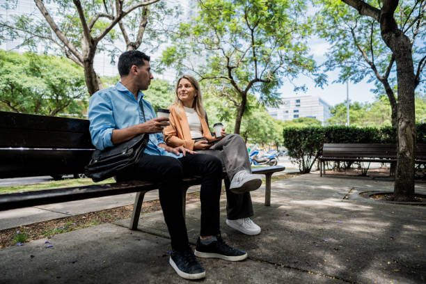 Coworkers talking outdoors
