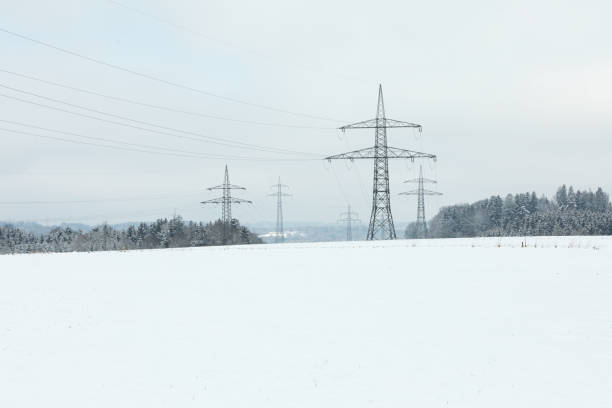 istock Electrical towers in winter landscape 2192157043