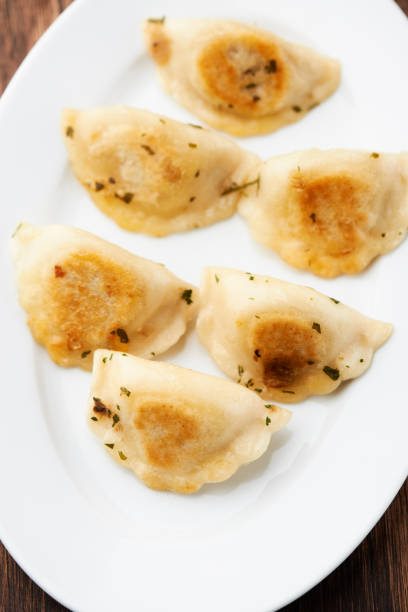 istock Dumplings with potato and cottage cheese stuffing (pierogi) 2192159099