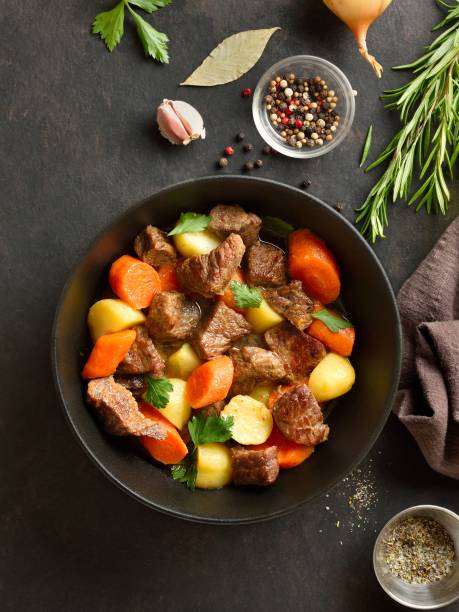 istock Beef stew with potatoes, carrots and greens 2192165231