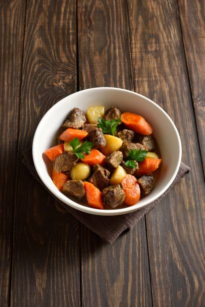 istock Beef meat stewed with potatoes, carrots and spices 2192165271