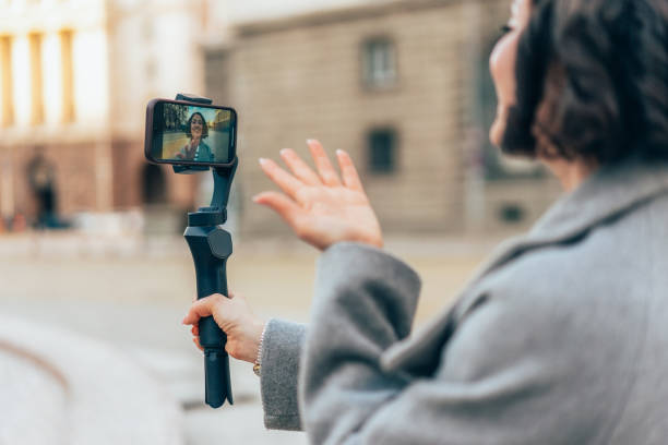 Female Influencer making video content for her vlog