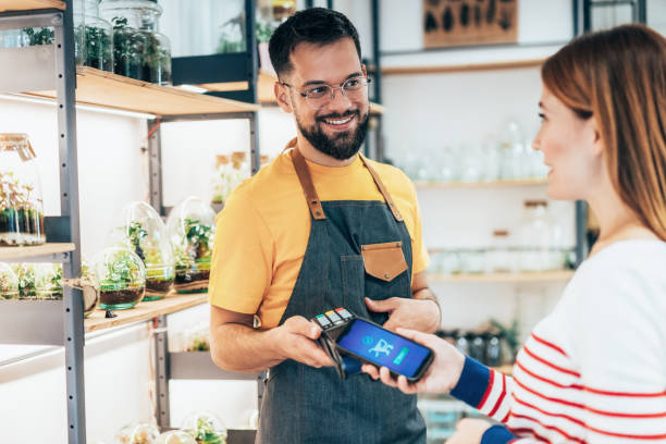 istock Contactless payment in flower shop 2192165433