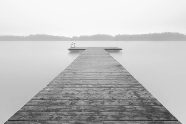 istock Lake Hartsee in Bavaria in the fall fog 2192170287