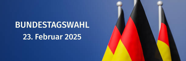 Text "Bundestagswahl 23. Februar 2023" (Federal Election) on Flags of Germany in front of a blue background. Selective focus on front flag. Text "Bundestagswahl 23. Februar 2023" (Federal Election) on Flags of Germany in front of a blue background. Selective focus on front flag. bundestag stock illustrations
