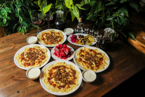 istock Delicious spread of traditional dishes with drinks and desserts 2192172854