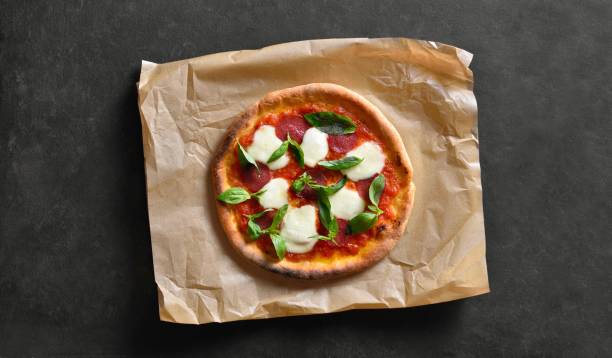 istock Pizza with mozzarella, pepperoni, tomato sauce and basil 2192172985