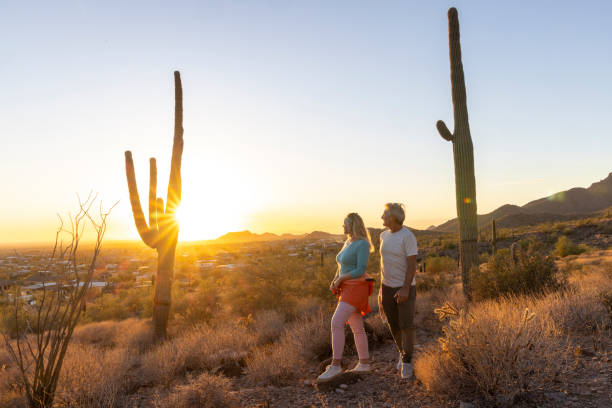 istock Mature couple explore desert landscape at sunset 2192175680