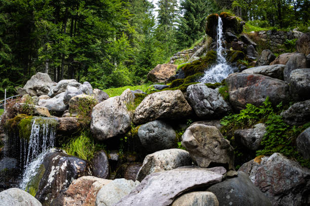 mountain waterfall stream among large stones