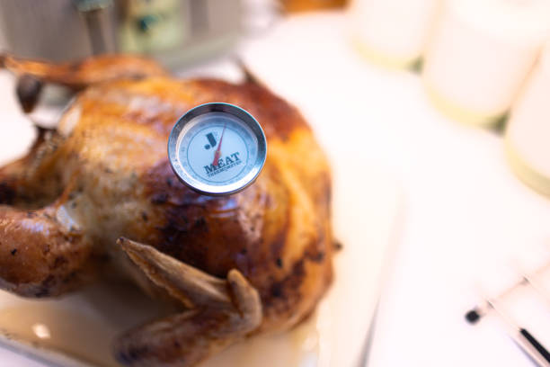 istock Meat thermometer checking the temperature of a freshly cooked turkey making sure its safe to eat 2192179721