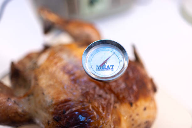 istock Meat thermometer checking the temperature of a freshly cooked turkey making sure its safe to eat 2192179729
