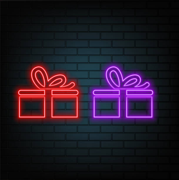 istock Gift box fly with bright glowing futuristic orange neon lights on black background. Holiday decoration. Festive gift surprise. 3D render illustration 2192181197