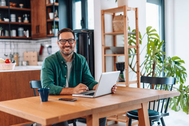 istock Businessman working from home smiling at the camera 2192181443