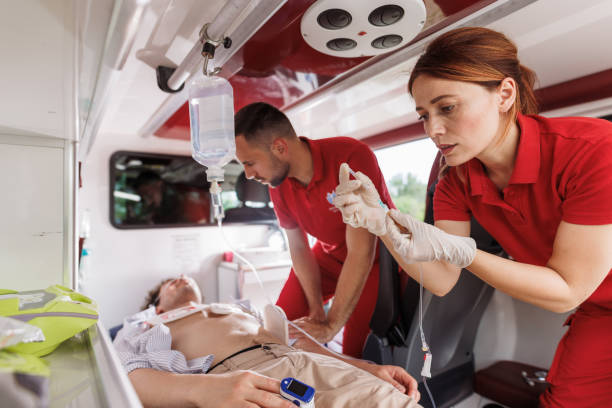 istock Paramedics providing emergency medical care inside an ambulance 2192183242