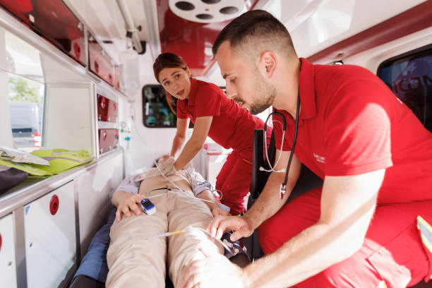 istock Paramedics providing emergency medical care inside an ambulance 2192183261