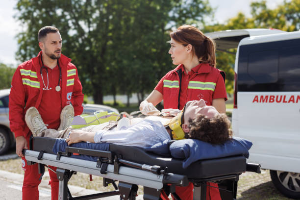 istock Emergency medical team assisting patient on the street 2192183270