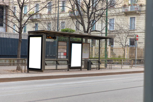 istock led blank billboard white screen side road in city. ad mockup copy space for advertising banner near bus stop 2192183680