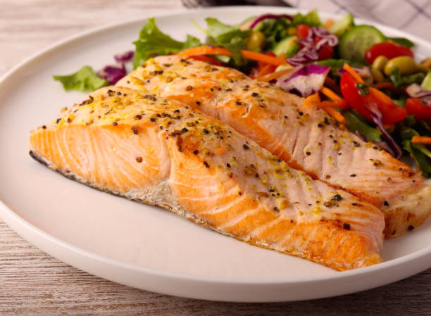 istock salmon fillet with salad 2192184232