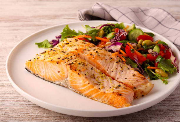 istock salmon fillet with salad 2192184948