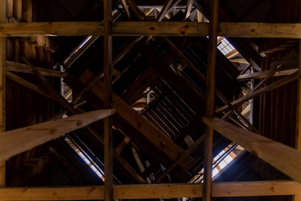 Intricate Wooden Roof Framework with Central Square Opening