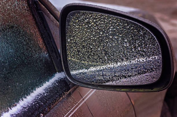 istock Ice on a car in Coden Alabama, rare Southern snow ice storm 2192185675