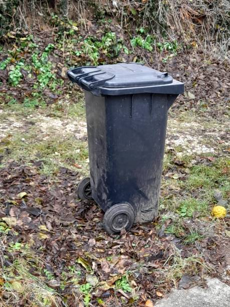 istock Gray trash can in the garden 2192186605