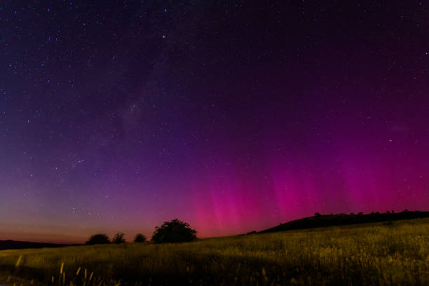 istock Aurora Australis display lights up the predawn sky in pinks 2192187312