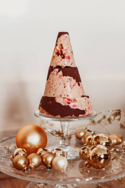 istock ice cream cake with chocolate and Christmas decorations 2192187745