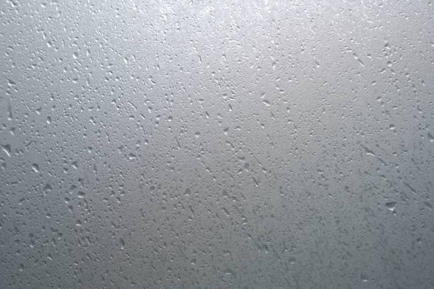 istock Misted glass background with rain outside 2192188804
