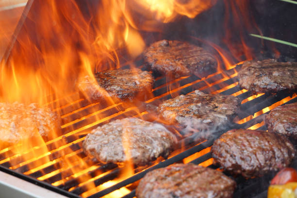 istock barbecue grill cooking burger steak on the fire 2192190567
