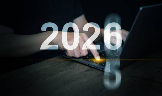 istock Happy New Year 2026. A man presses enter button on his laptop computer to change the year from 2025 to 2026 to start the new year. 2192190895