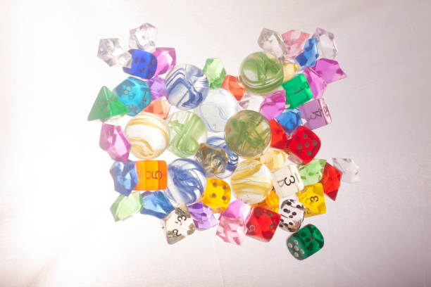 istock marbles dices and toys on a white background 2192191093