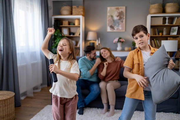 istock Kids entertain with singing and pillow dance at home 2192200224