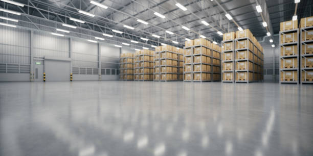 istock 3d rendering blur background of warehouse and concrete floor suit for industrial background. 2192200949