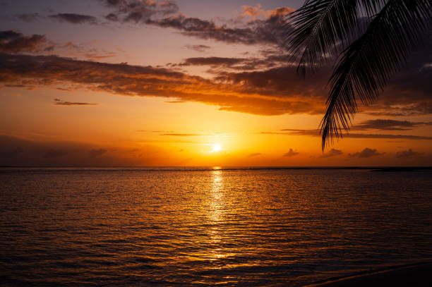 Twilight background of sunset over the tropical ocean