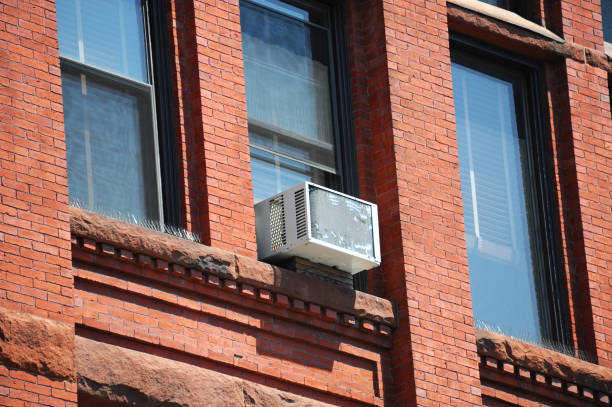 istock old air conditioner installed on house window 2192214095