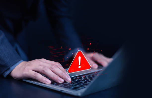 istock Cyber ​​attack alert on laptop. Cyber ​​attack on computer network. Virus, spyware, malware or malicious software. Businessman background. 2192216725