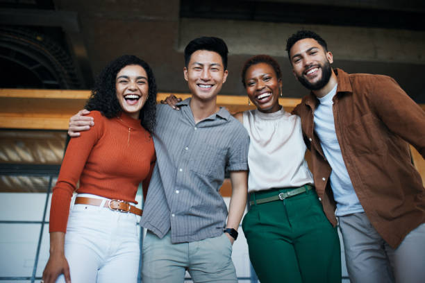 istock Joyful Team of Four Embracing 2192216967