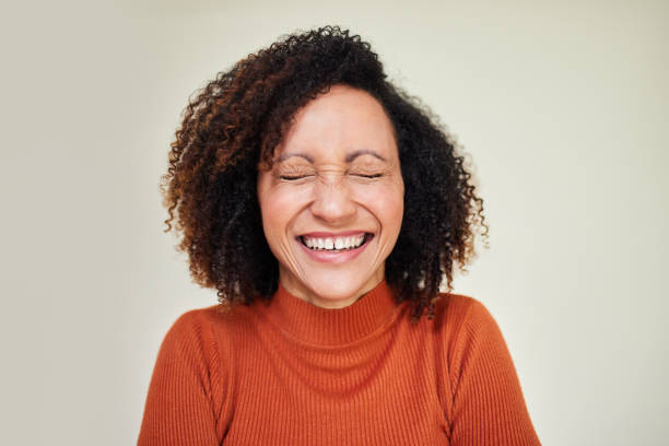 istock Radiant Joy: Woman Bursting with Laughter 2192217334