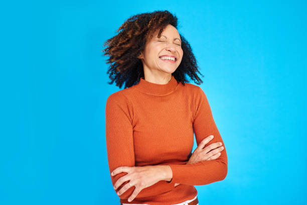 istock Joyful Woman Bursting with Laughter 2192217385