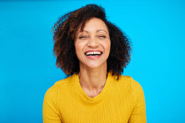 istock Pure Joy: Woman Laughing with Eyes Closed 2192217423