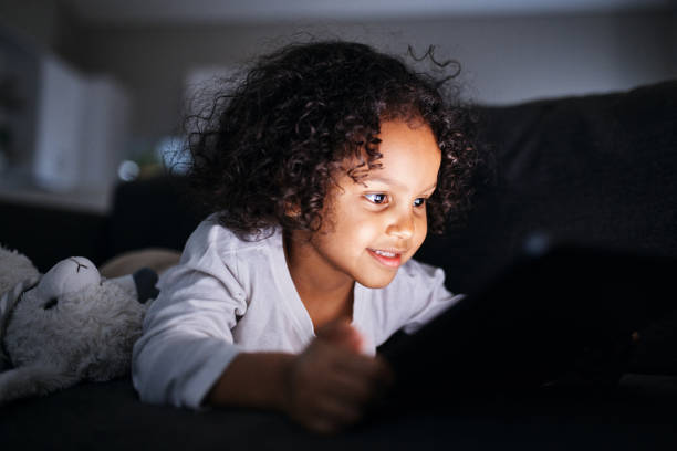 istock Enchanted by the Screen's Glow 2192217466