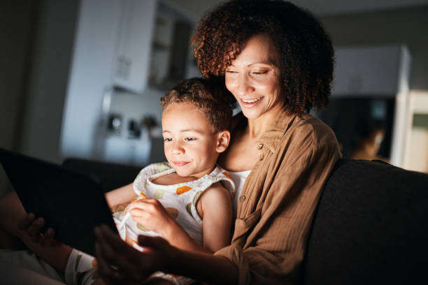 istock Cozy Evening Story Time with Mom 2192217497